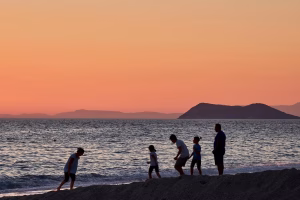 Family enjoying slow travell on the beach