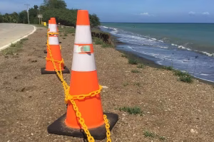 Safety cones lined on the beach
