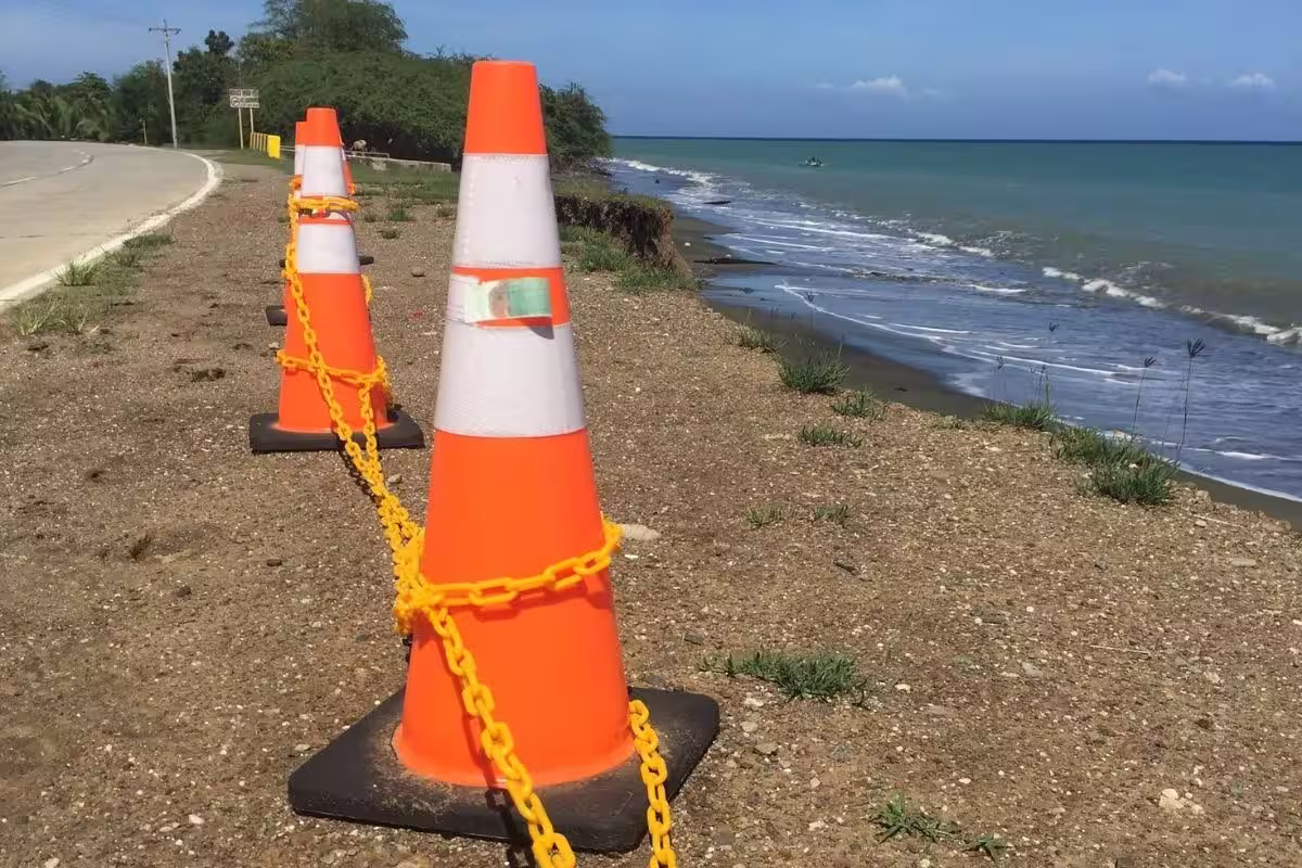 Safety cones lined on the beach